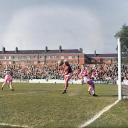 Wrexham goalkeeper Rolando Ugolini saves from Queens Park Rangers Brian Bedford October 1959.