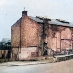 St. Georges Crescent Pensons Theatre from the East side and rear of the building viewed from Smithfield Road once known as Theatre Road