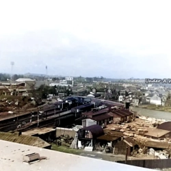 View towards Mold Road in the centre is the old Railway Club at the back of Kirbys with Davies & McCords builders yard at the bottom of the picture